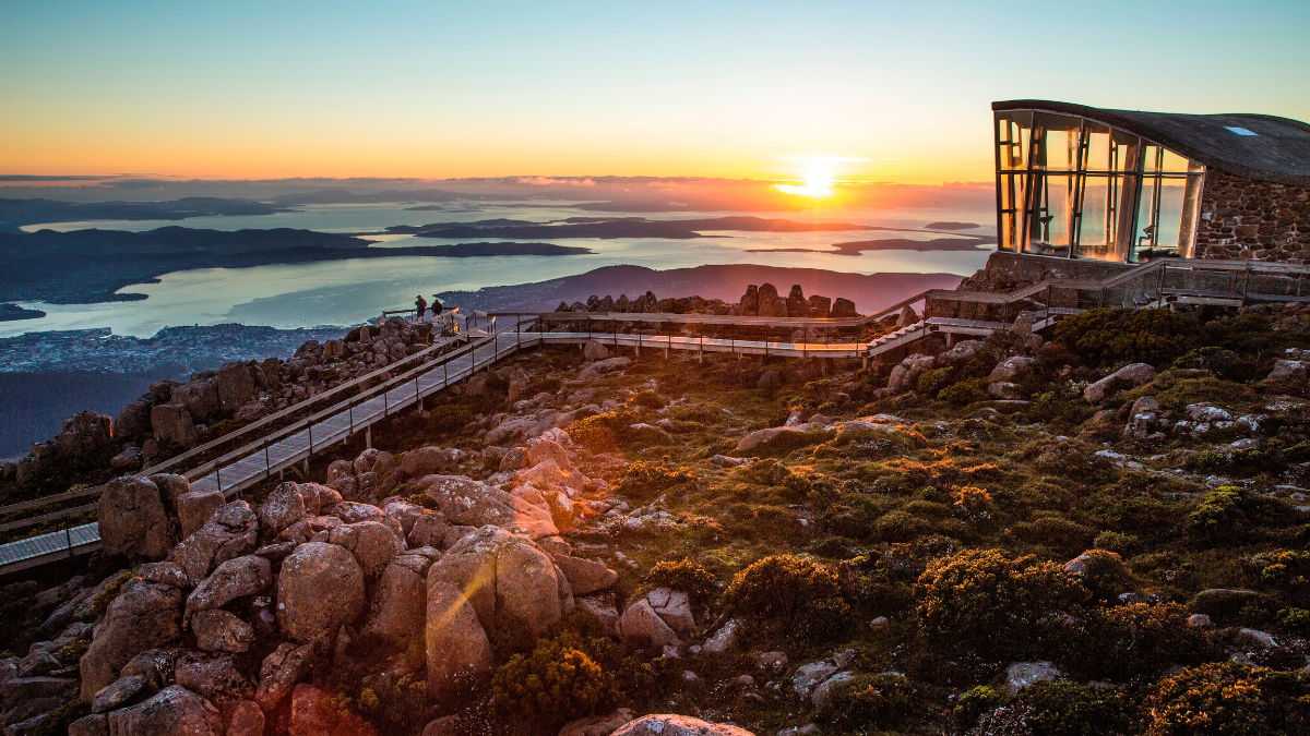 "An uplifting image of a sunrise illuminating a beautiful landscape, signifying hope, a fresh start, and the promise of a brighter, stronger future on the journey of building resilience."